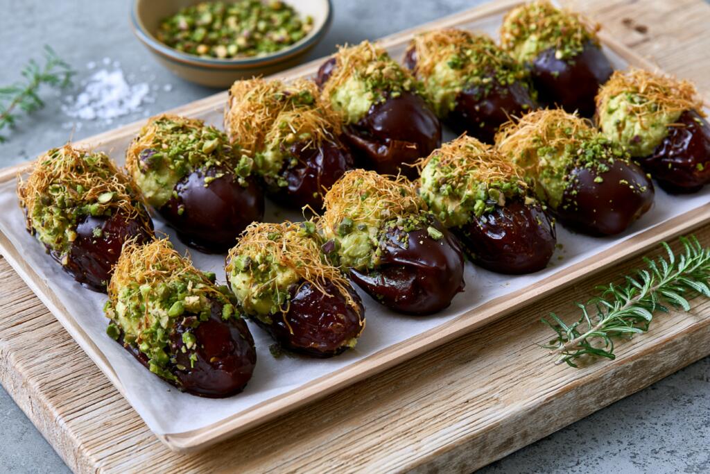 Tray of finished Dubai chocolate protein stuffed dates before chilling