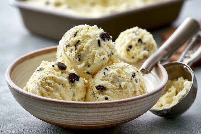 Creamy scoops of high protein cottage cheese ice cream in a bowl with chocolate chips