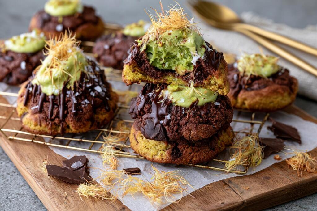 Baked Dubai chocolate cookies cooling on a tray before getting kataifi and chocolate topping