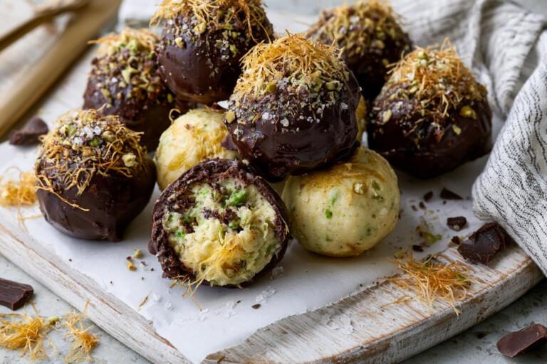 Plated Dubai chocolate protein bites with pistachio kataifi filling and dark chocolate coating