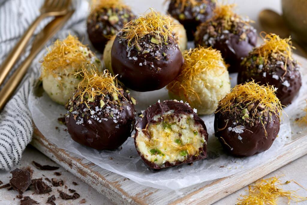Plated Dubai chocolate protein bites with pistachio kataifi filling and dark chocolate coating